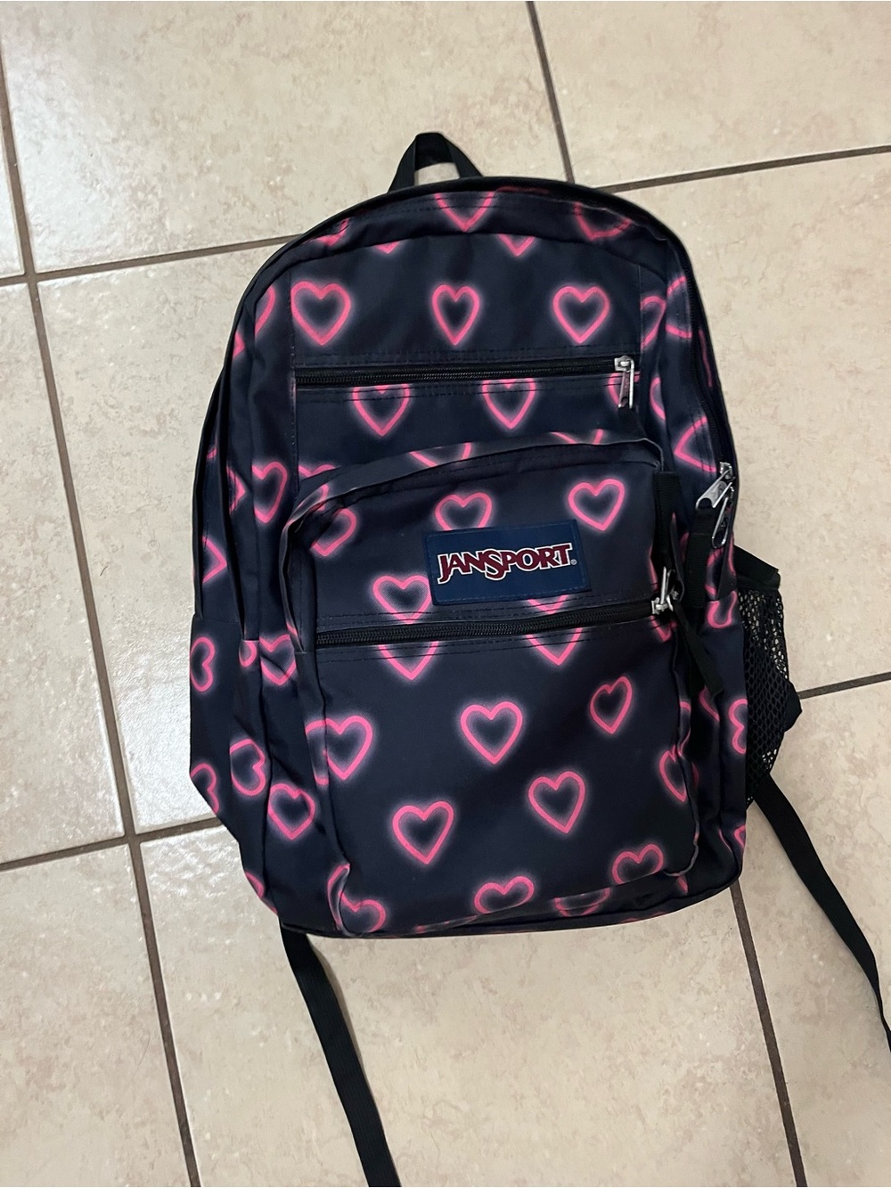 Jansport Black Backpack with Neon Pink Heart Print